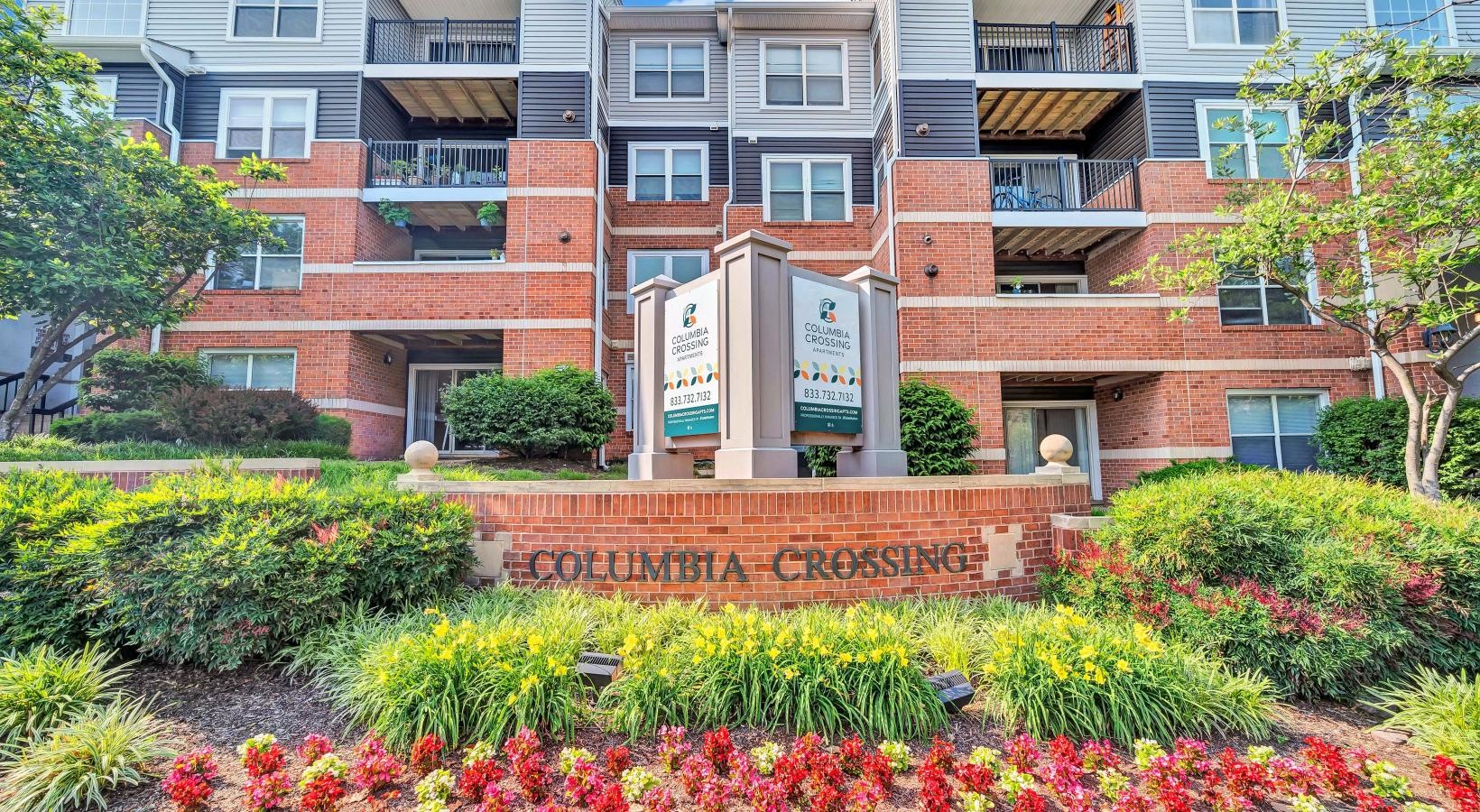 A perfect fit for the whole family a building with a garden in front of it